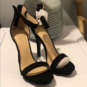 Women’s black ankle strap stiletto heels